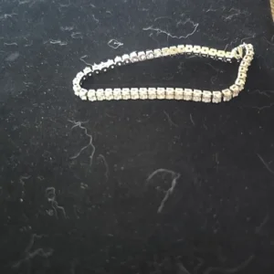 Exquisite 6 3/4" Tennis Bracelet.